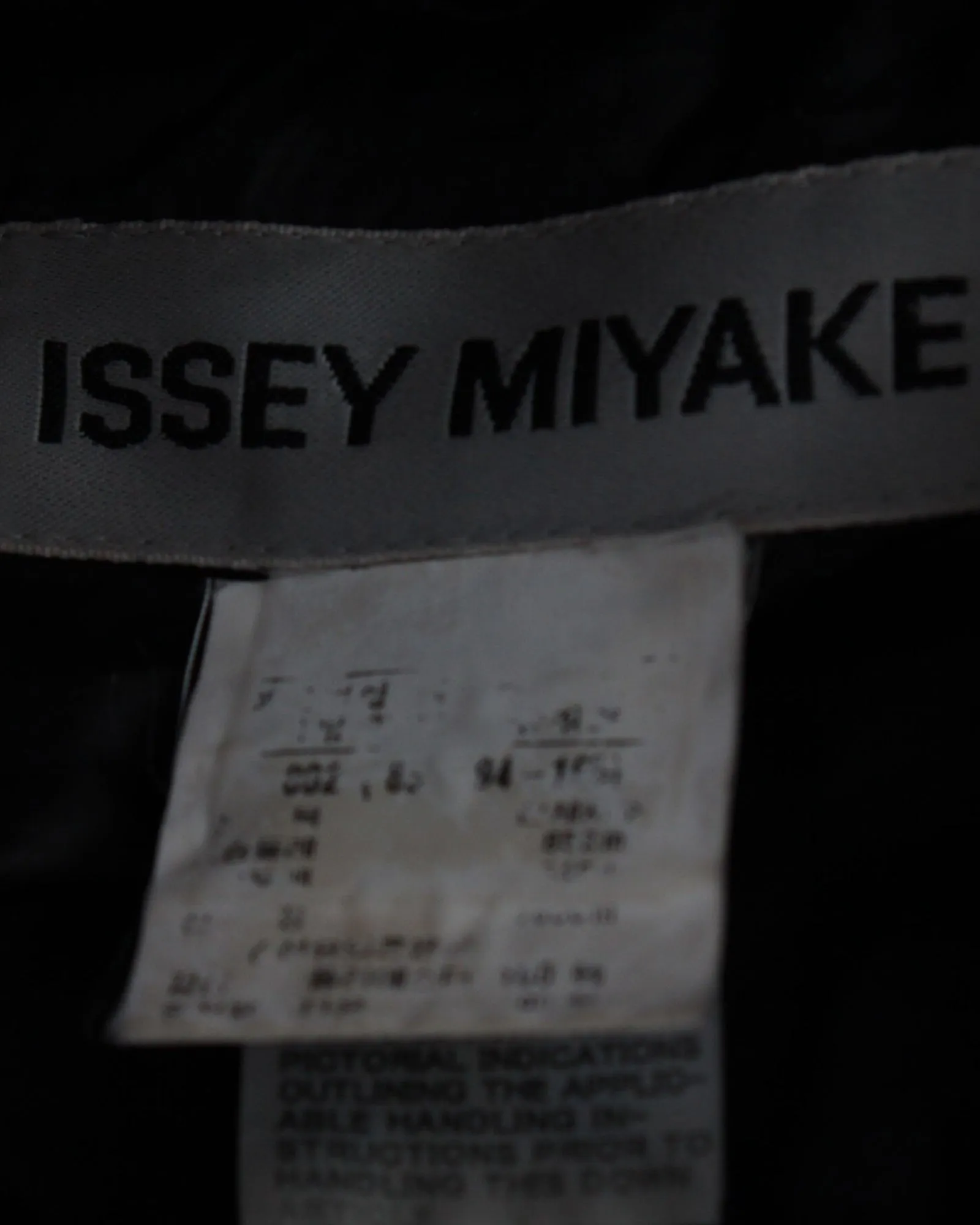 Issey Miyake Knit Collar Down Coat in Black Nylon